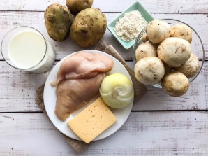 Курица с грибами запеченная под картофельной шубой