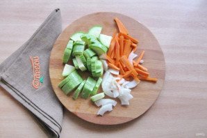 Карп на овощной подушке