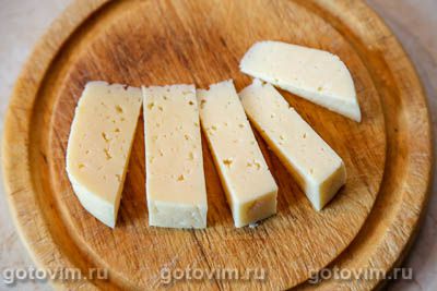 Рулетики из кабачков с беконом и сыром, запеченные в формочках для кексов Рулетики из кабачков с беконом и сыром, запеченные в формочках для кексов