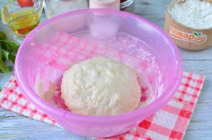 Пицца с прошутто и рукколой