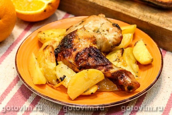 Куриные бедра с апельсином, медом и розмарином в духовке