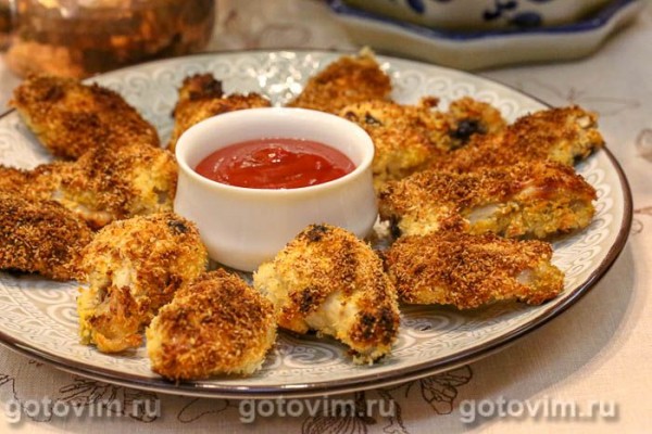 Куриные крылышки, жаренные в кокосовой стружке Куриные крылышки, жаренные в кокосовой стружке