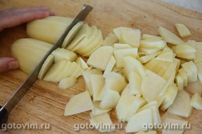 Свинина, запеченная в пакете с картофелем, капустой и грибами Свинина, запеченная в пакете с картофелем, капустой и грибами