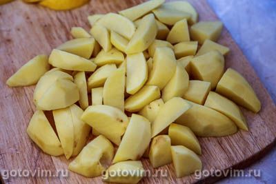 Куриные бедра, запеченные с картошкой, чесноком и лимоном