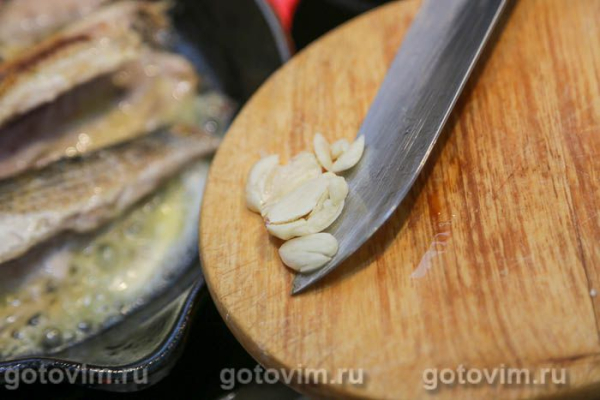 Кефаль, жаренная с апельсином и чесноком Кефаль, жаренная с апельсином и чесноком